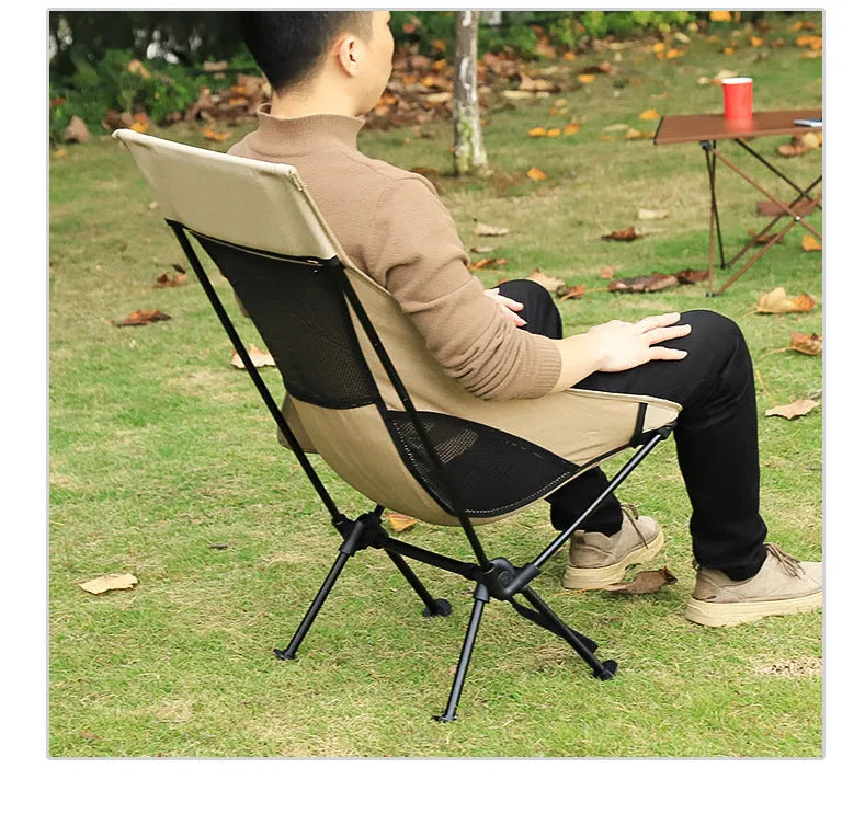Beige outdoor folding chair with aluminum alloy frame and compact fold design for portable seating