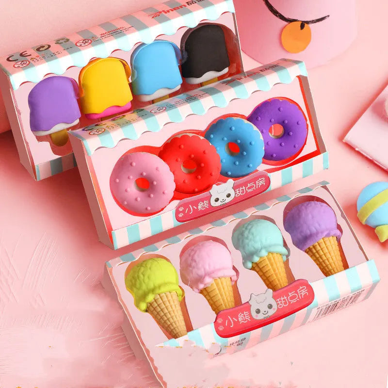 Assortment of 12 colourful cartoon food shaped pencil erasers including ice cream cones, donuts, and lollipops.