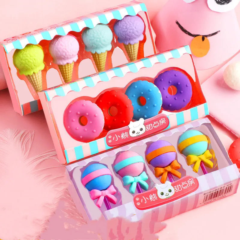 Assortment of 12 colourful cartoon food shaped pencil erasers including ice cream cones, donuts, and lollipops.