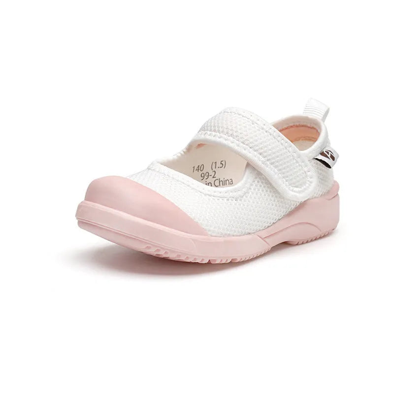 White and pink toddler cloth shoes with mesh uppers and a Velcro fastening strap.