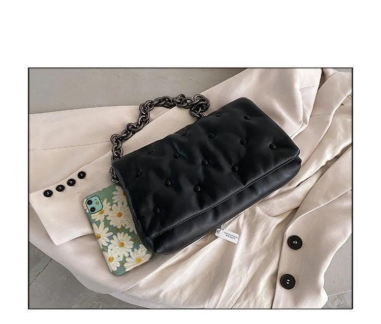 Black small square shoulder bag with PU outer, polyester cotton lining, magnetic buckle and single chain shoulder strap