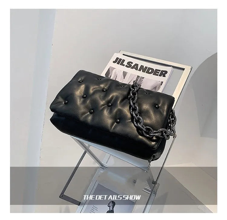 Black small square shoulder bag with PU outer, polyester cotton lining, magnetic buckle and single chain shoulder strap