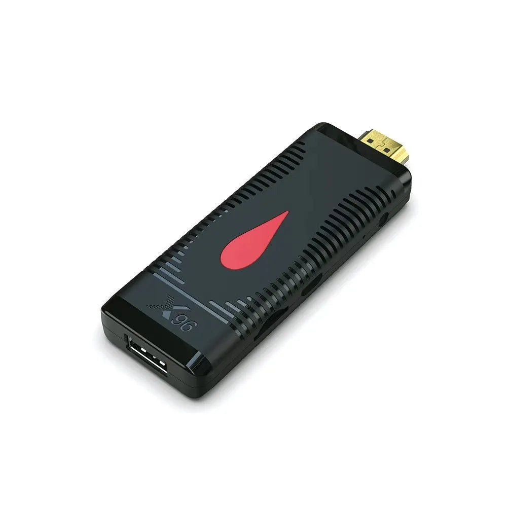 Compact Android TV streaming stick dongle with HDMI connector and remote control.