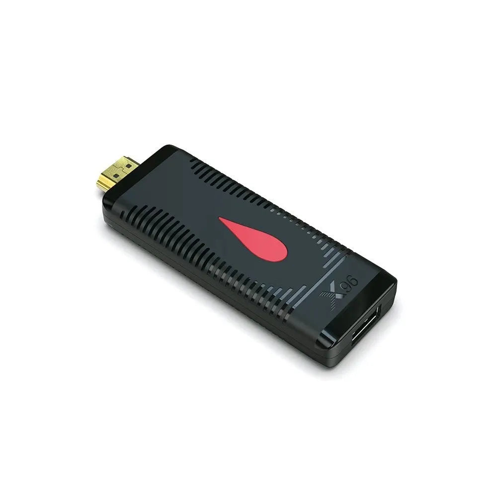 Compact Android TV streaming stick dongle with HDMI connector and remote control.