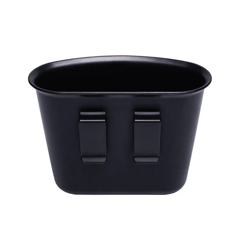 Black universal hanging car storage bucket used as a car trash can inside a vehicle