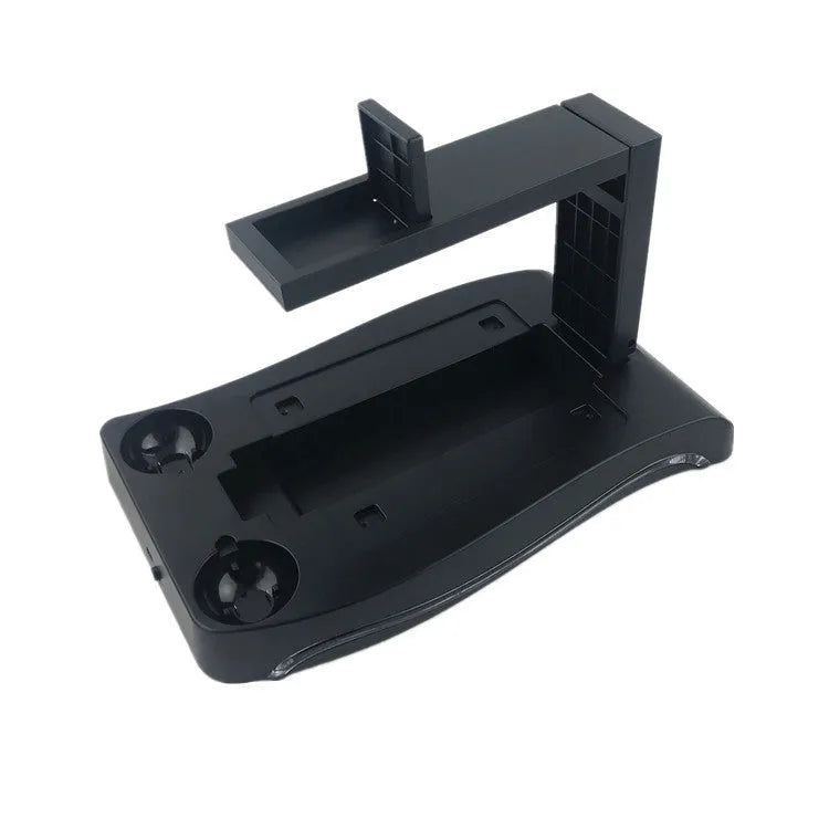 Black ABS plastic PS4 VR game controller charging dock on a flat surface.