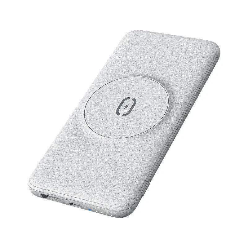 Maiduo mint green Magsafe magnetic wireless charging power bank attached to an iPhone.