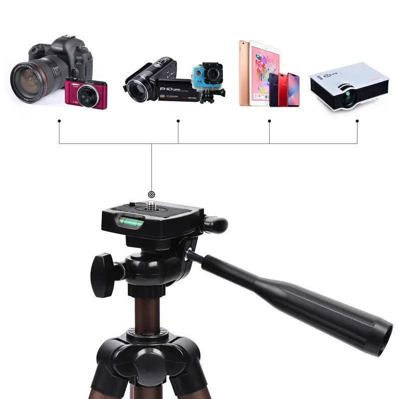 Aluminium camera tripod extended to 1.3m with hydraulic head, Bluetooth remote, and phone holder for iPhones.