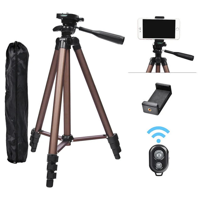 Aluminium camera tripod extended to 1.3m with hydraulic head, Bluetooth remote, and phone holder for iPhones.