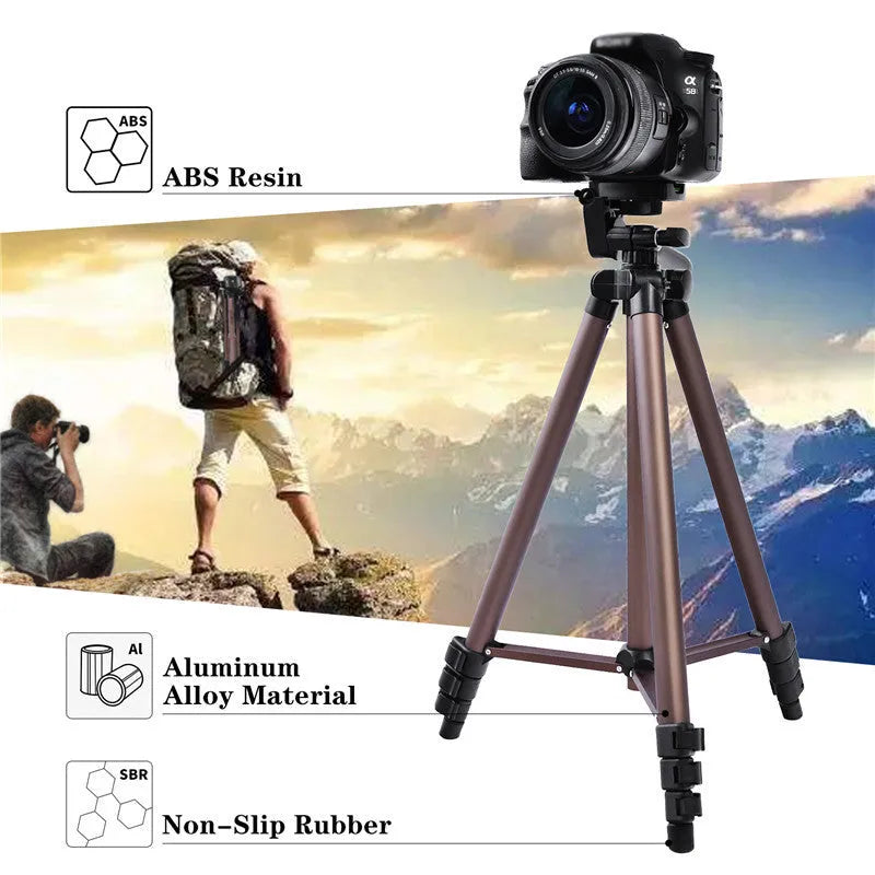 Aluminium camera tripod extended to 1.3m with hydraulic head, Bluetooth remote, and phone holder for iPhones.