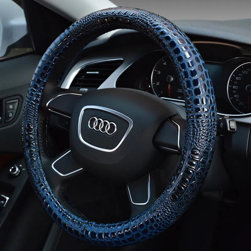 Leather steering wheel cover in black, blue, or light coffee, universal 38cm fit for all-season use.