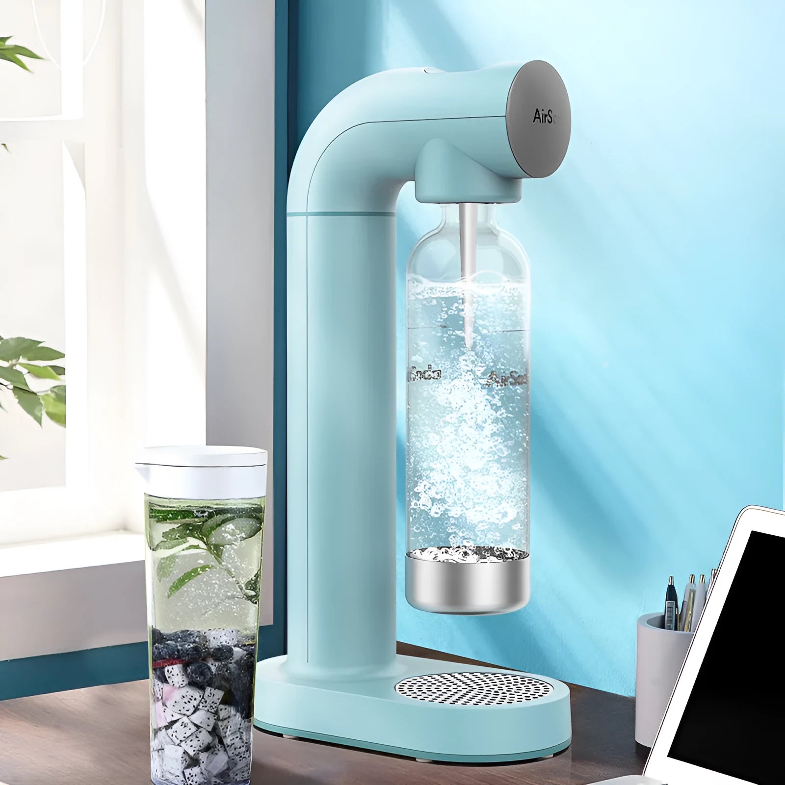 Airsoda bubble water machine in black with 1L pot body, push-button control, and scale indicator on countertop