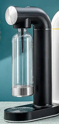 Airsoda bubble water machine in black with 1L pot body, push-button control, and scale indicator on countertop