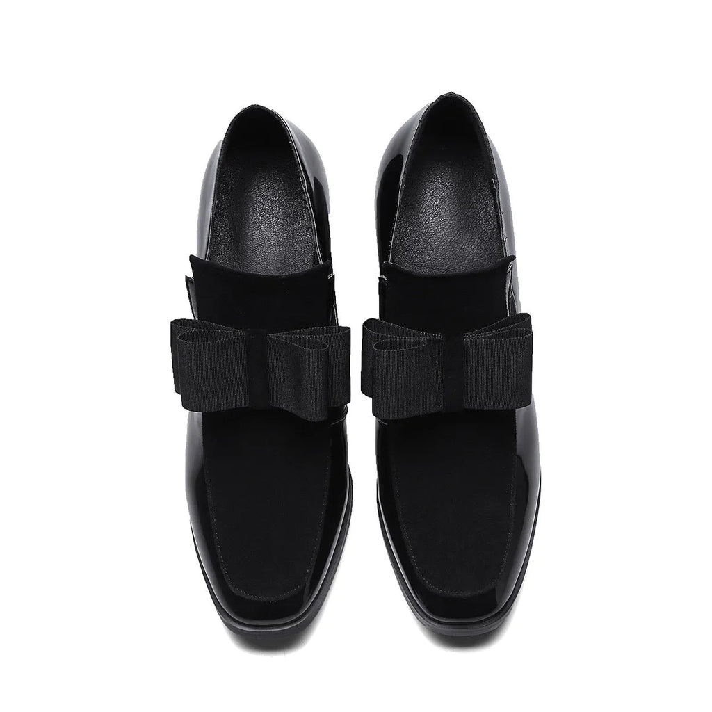 Black patent leather women's high heel shoes with a thick block heel and square toe.