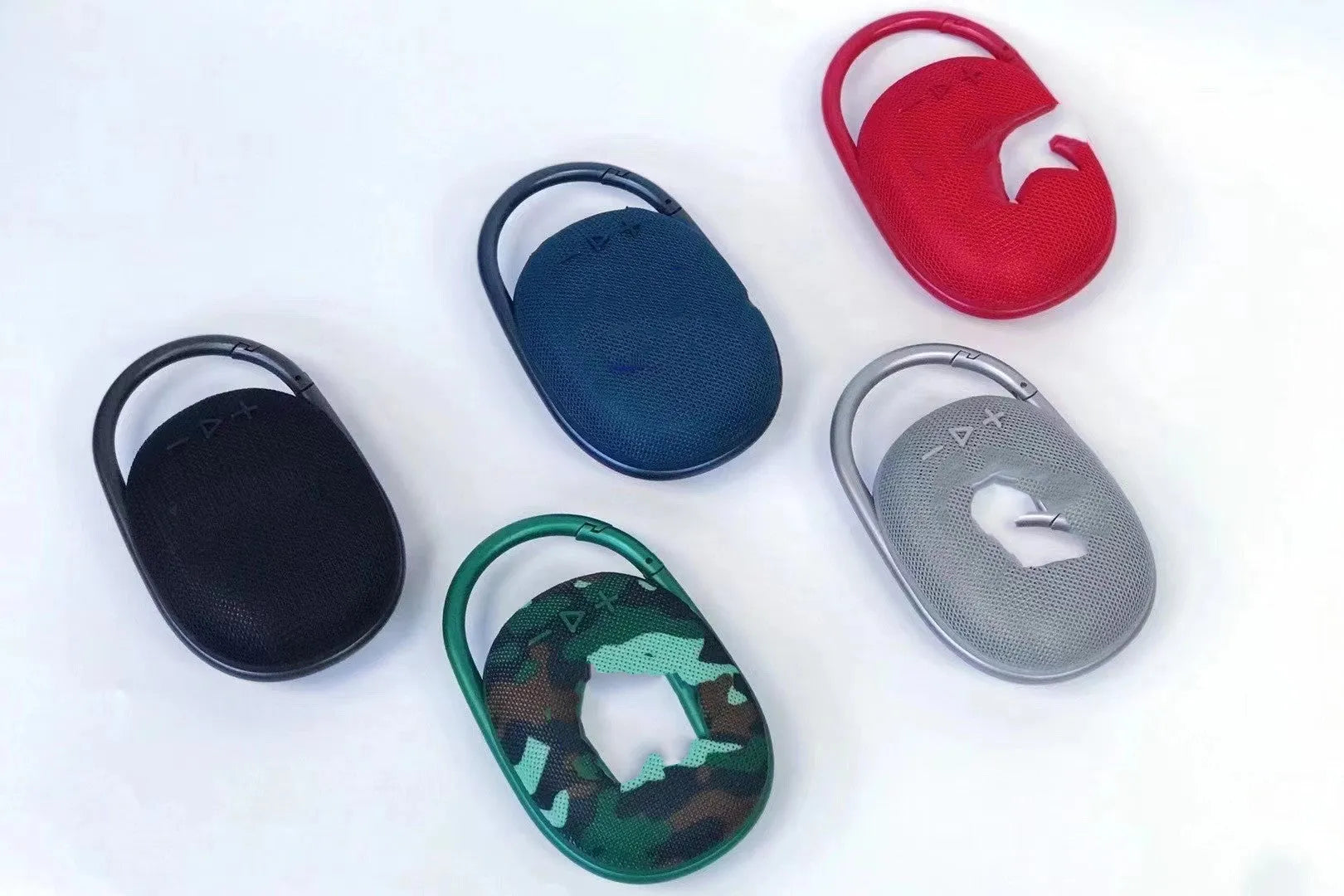 Compact portable Bluetooth speaker in silver grey colour with USB port.