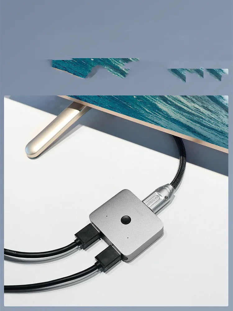 Grey HDMI one to two splitter switcher device for 4K video distribution to computer TV monitor displays