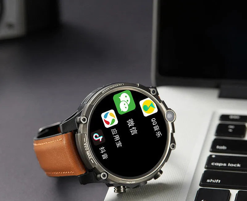 Black adult smartwatch with 1.6 inch screen on a wrist strap, showing 4G, dual camera and heart rate features.