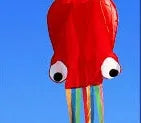 Large 4-metre octopus soft kite in red with 30-metre line and control handle on beach