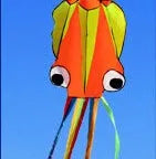 Large 4-metre octopus soft kite in red with 30-metre line and control handle on beach