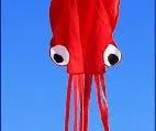 Large 4-metre octopus soft kite in red with 30-metre line and control handle on beach