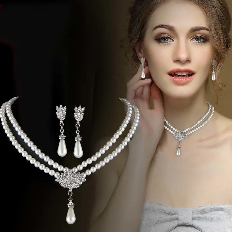 European and American alloy necklace set with pearl and crystal drop pendant and earrings on white background