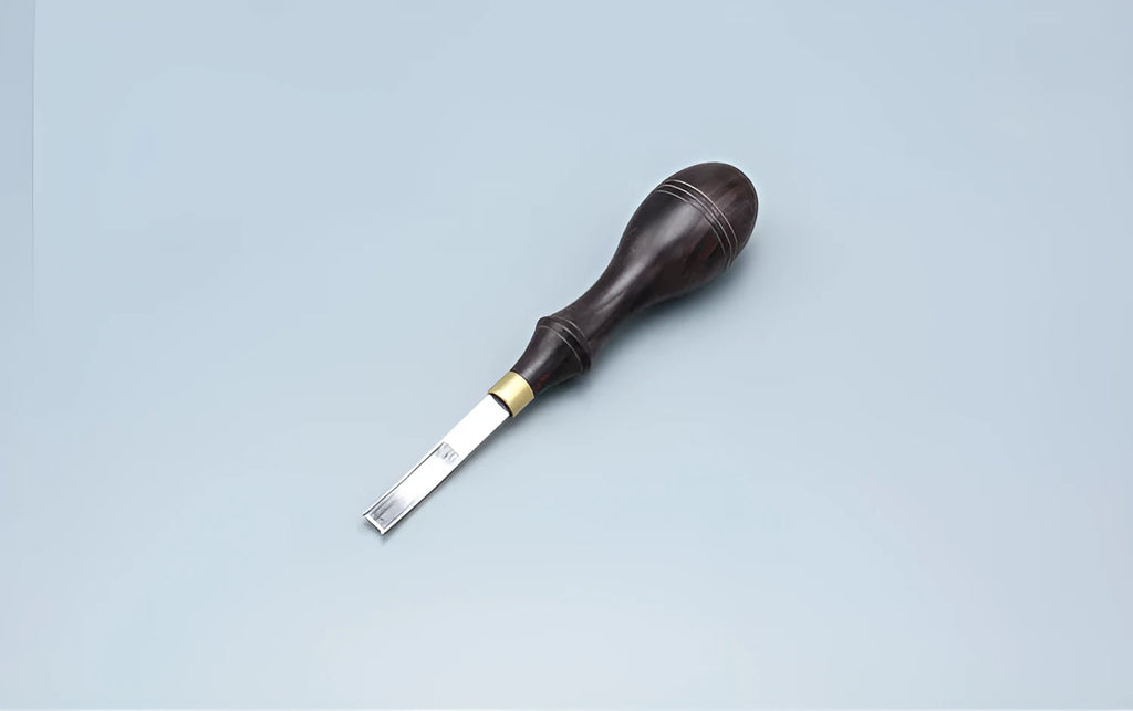 Professional hair thinning knife with leather handle, showing sectional cutting and wide shovel edges.