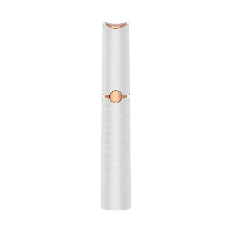 Electric eyebrow trimmer in white with LED light, rechargeable battery, and USB cable on a clean surface