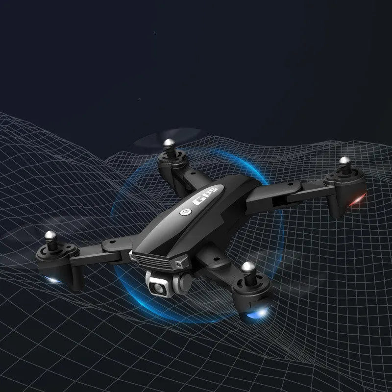 Black and red folding quadrocopter drone with remote control handle for children