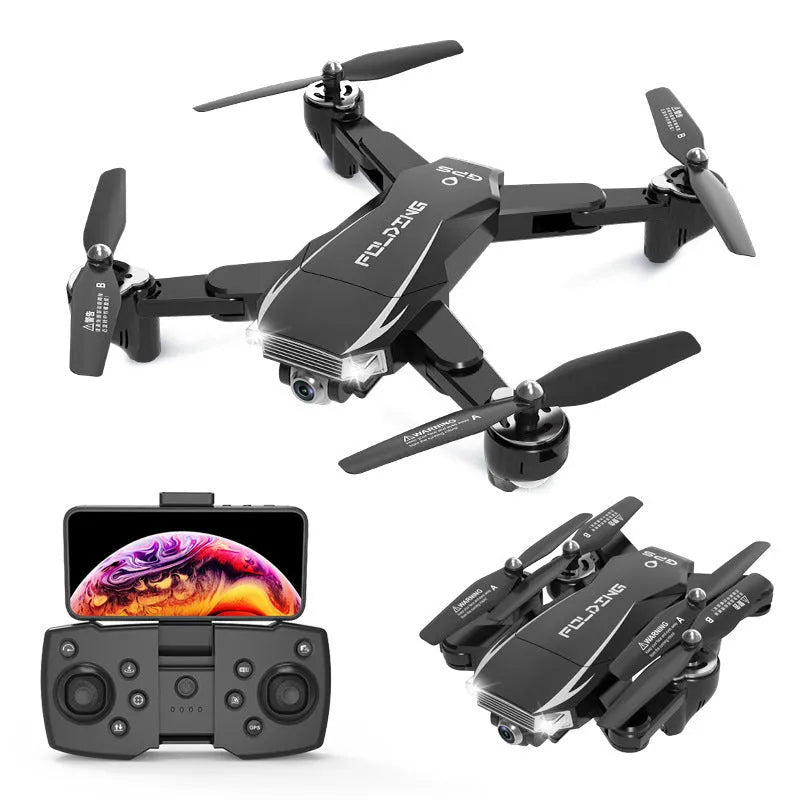 Black and red folding quadrocopter drone with remote control handle for children