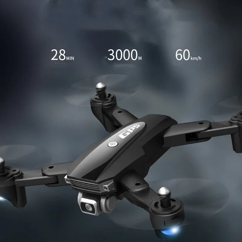 Black and red folding quadrocopter drone with remote control handle for children