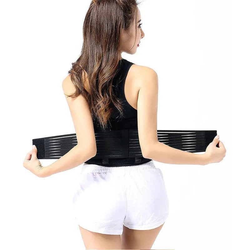 Black elastic self-heating waist belt with magnetic therapy laid flat.