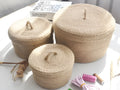Japanese style fabric storage basket with a cover for tabletop organisation in three sizes.
