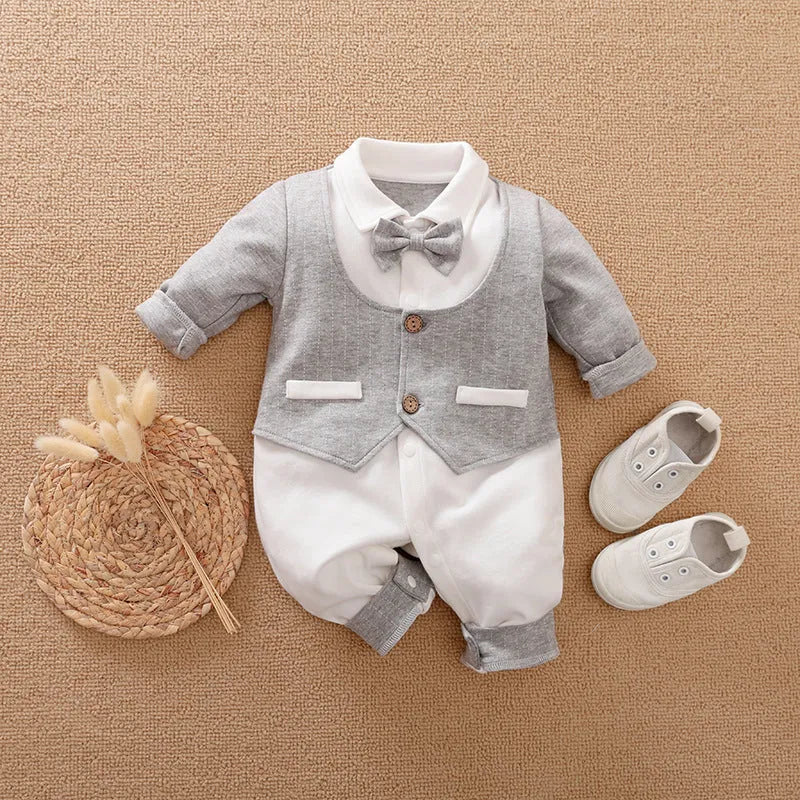 Baby wearing a long-sleeved cotton jumpsuit in navy blue gentleman style