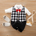 Baby wearing a long-sleeved cotton jumpsuit in navy blue gentleman style