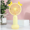 A cartoon-style hand-held USB rechargeable fan shown in blue, green, pink, and yellow colour options.
