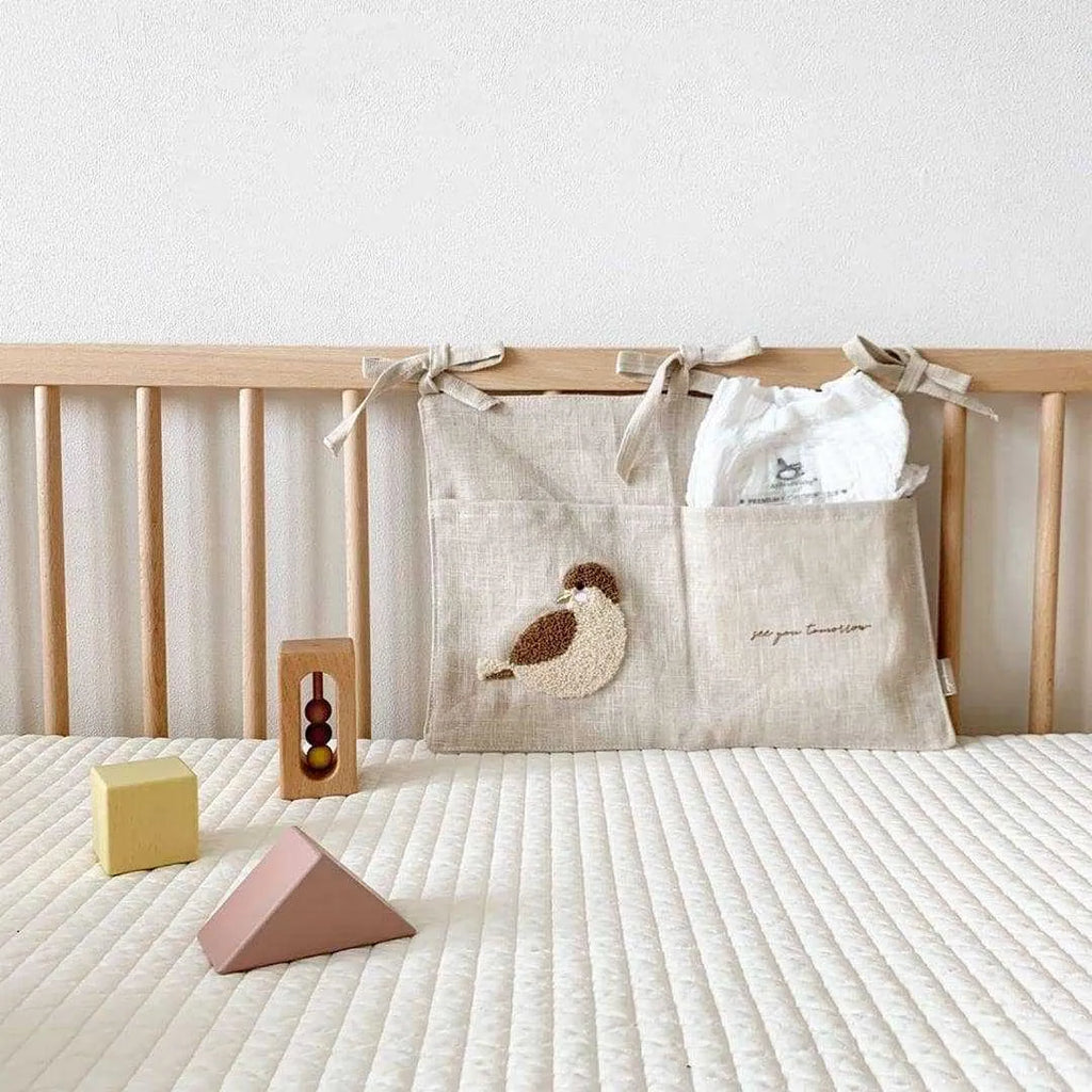Khaki cotton linen hanging storage bag with single pocket designed for bedside organisation