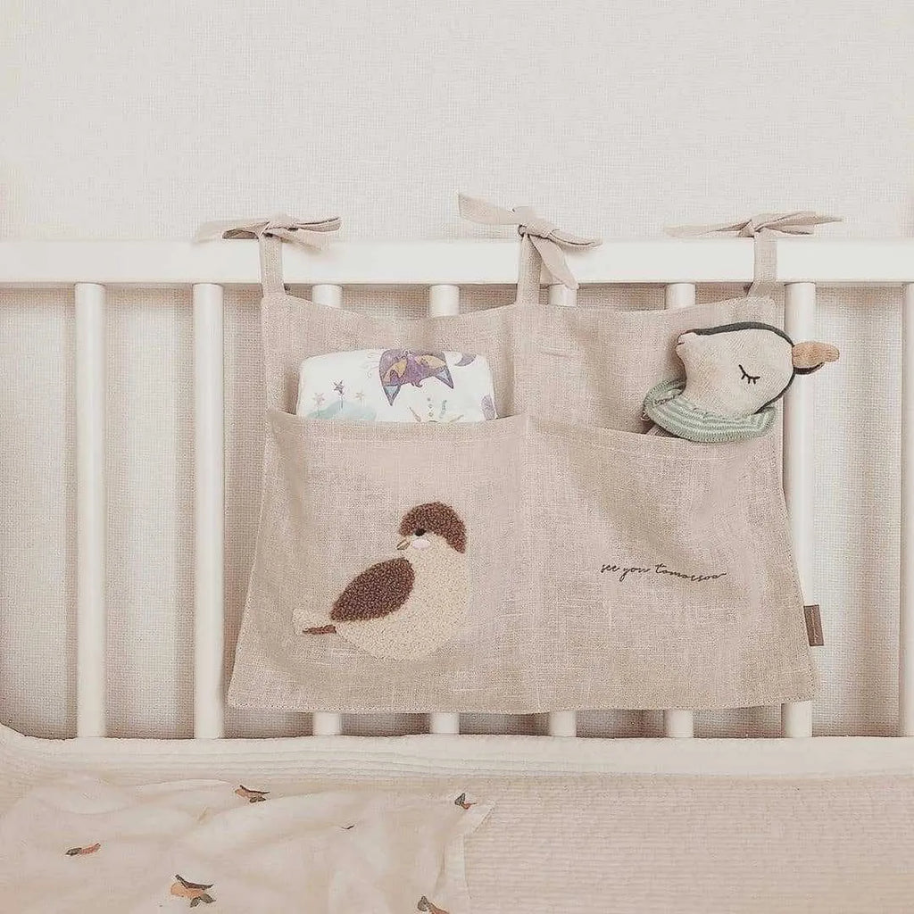 Khaki cotton linen hanging storage bag with single pocket designed for bedside organisation