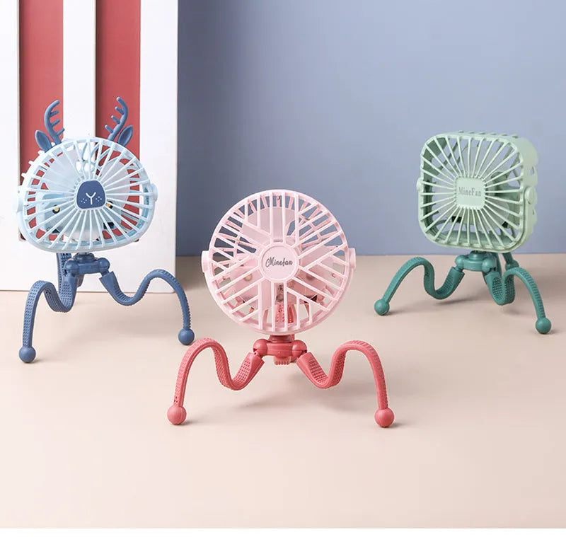 Pink USB rechargeable octopus stroller fan with flexible legs attached to a baby pushchair