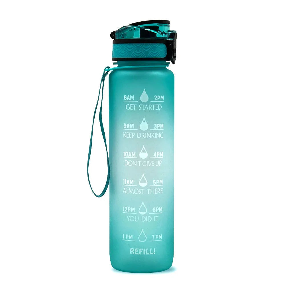 Blue and red gradient 1 litre Tritan sports water bottle with time markers and a black flip-top lid.