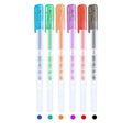 Metal quicksand gel pens with pearlescent finish showing colour development on dark paper