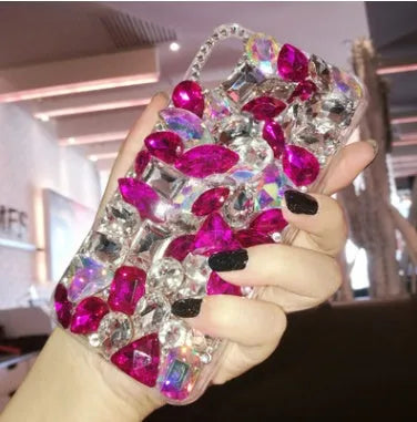 Clear soft-edge iPhone case with crystal rhinestone gem design on back
