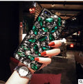 Clear soft-edge iPhone case with crystal rhinestone gem design on back