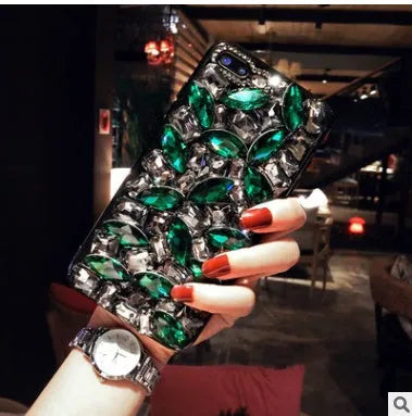 Clear soft-edge iPhone case with crystal rhinestone gem design on back