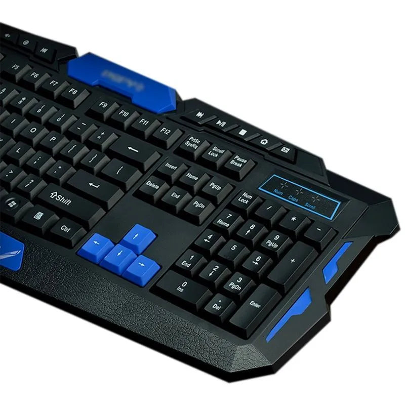 Black and blue wireless keyboard and mouse set on a desk, showing ergonomic design.
