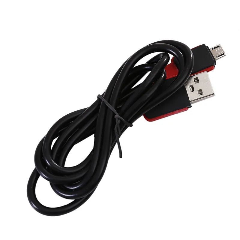 Red USB rechargeable COB LED flashlight with magnetic base shown on a metal surface.