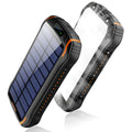 Orange solar power bank with LED camping light showing size compared to mobile phone