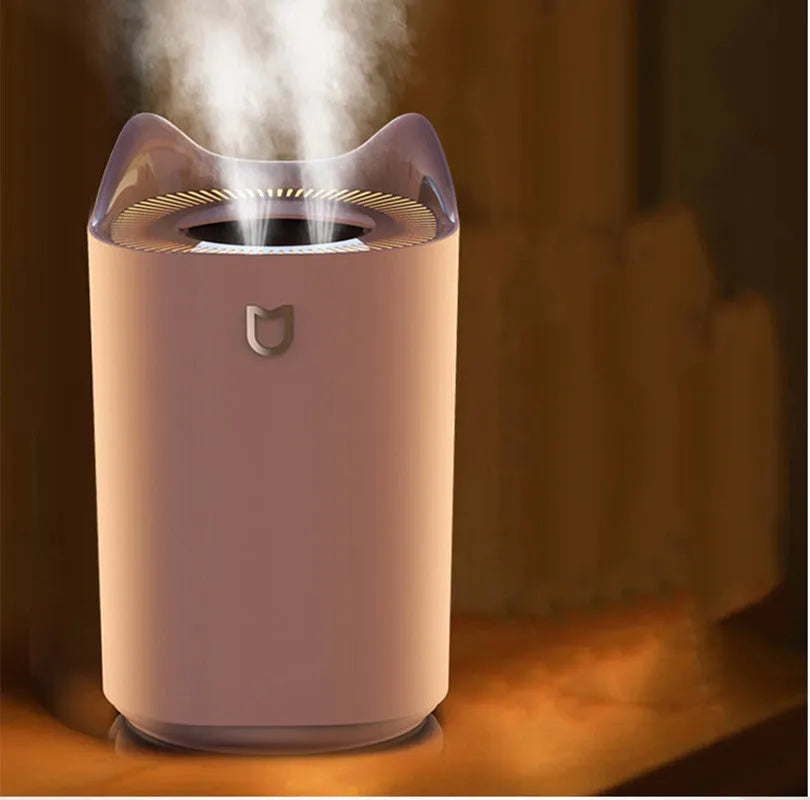 Double spray humidifier and aroma diffuser unit with three mist outlets in Coral Pink colour.