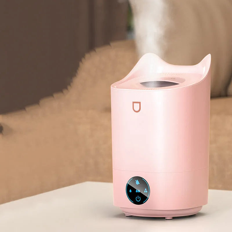 Double spray humidifier and aroma diffuser unit with three mist outlets in Coral Pink colour.