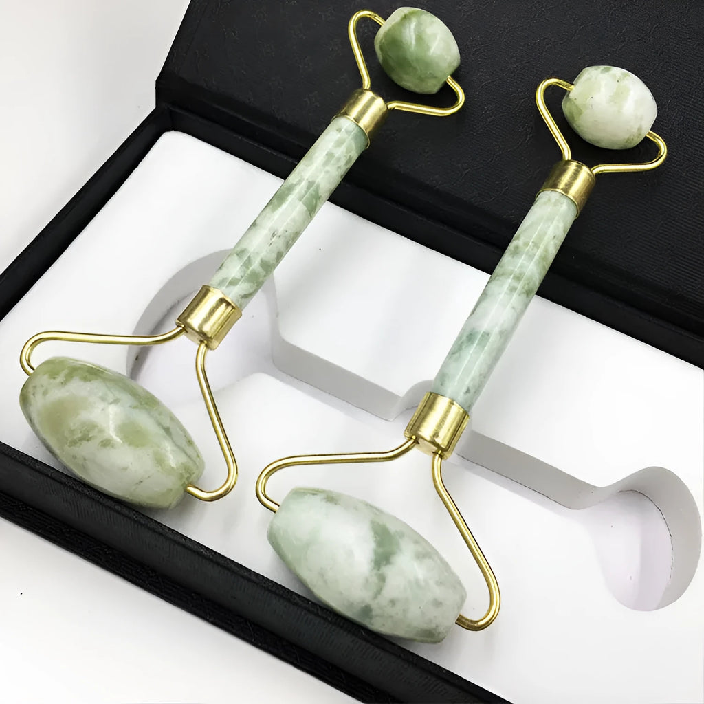 Xiuyu jade double-headed facial massage roller stick on white background