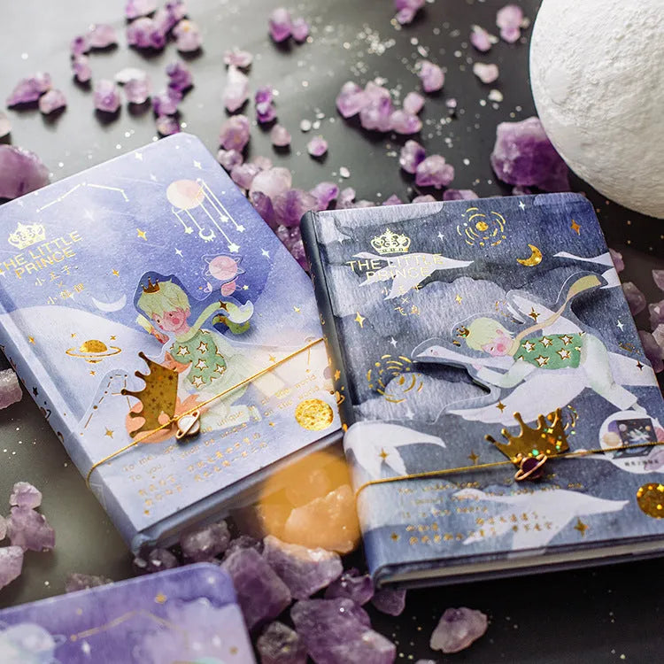 Hardback notebook with The Little Prince cartoon cover illustration in four design options